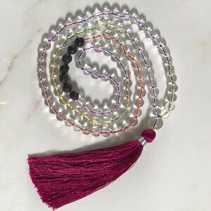 CLEAR QUARTZ AND BLACK LAVA MALA SEMI-PRECIOUS STONES WITH A FUCHSIA TASSEL